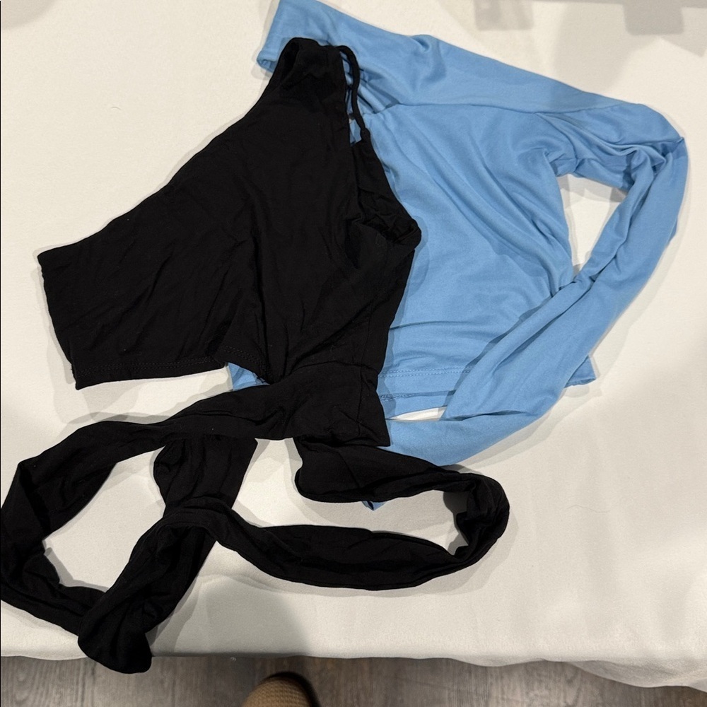 Two Jordyn Jagger tops. Both size medium.